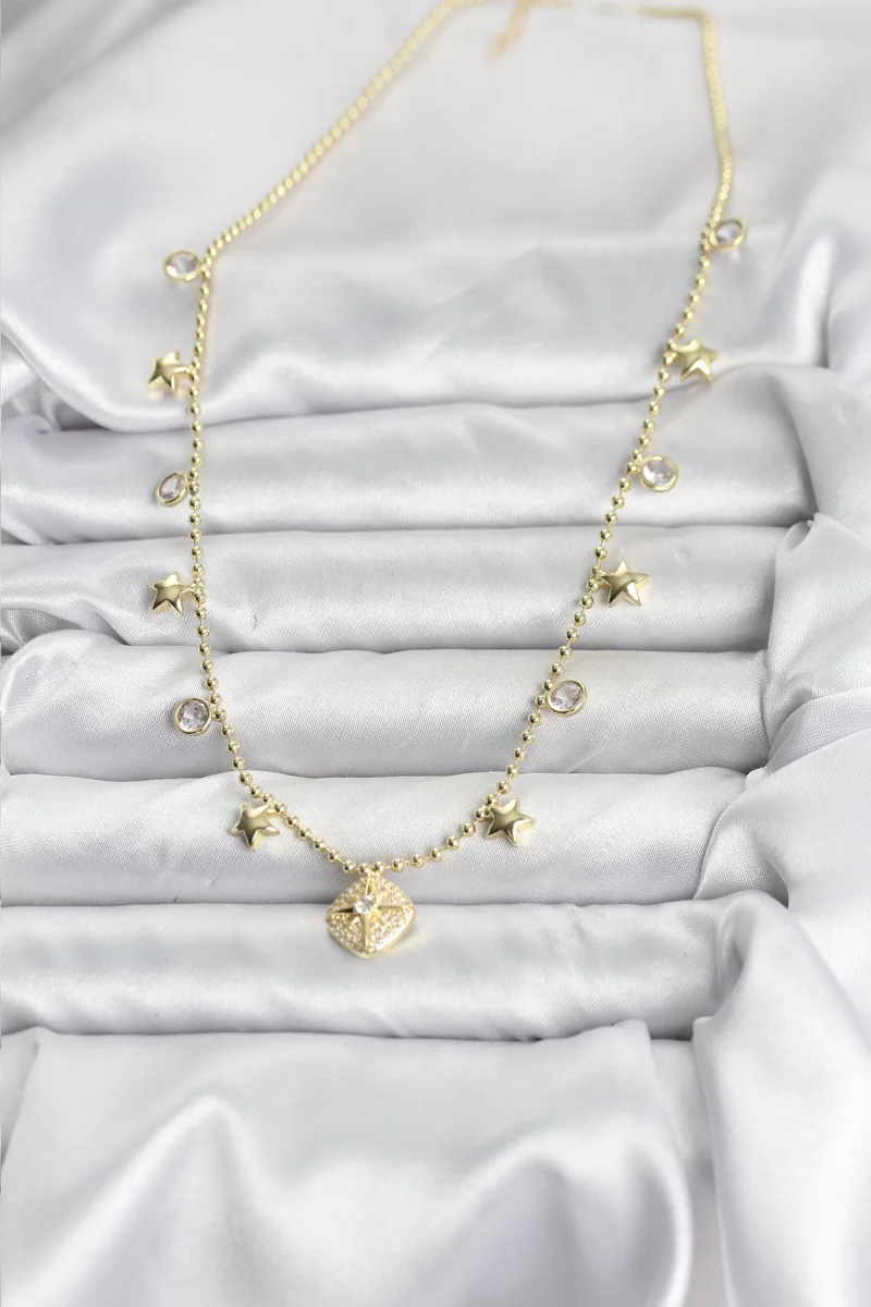 Pirinç Gold Renk Zirkon Taşlı Kutup Yıldızı Model Kadın Kolye