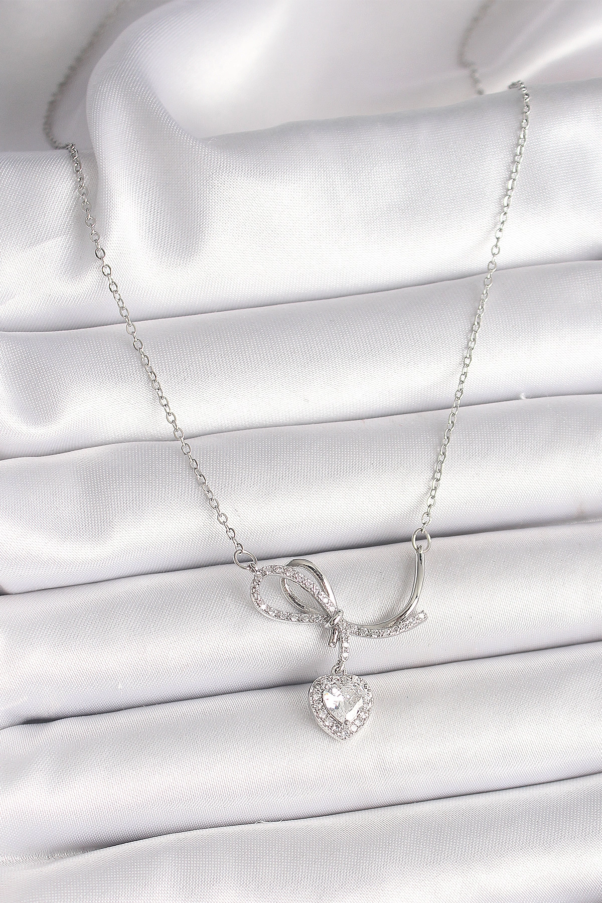 316L Çelik Gümüş Renk Zincir Zirkon Taşlı Düğüm Sallantı Kalp Figür Kadın Kolye