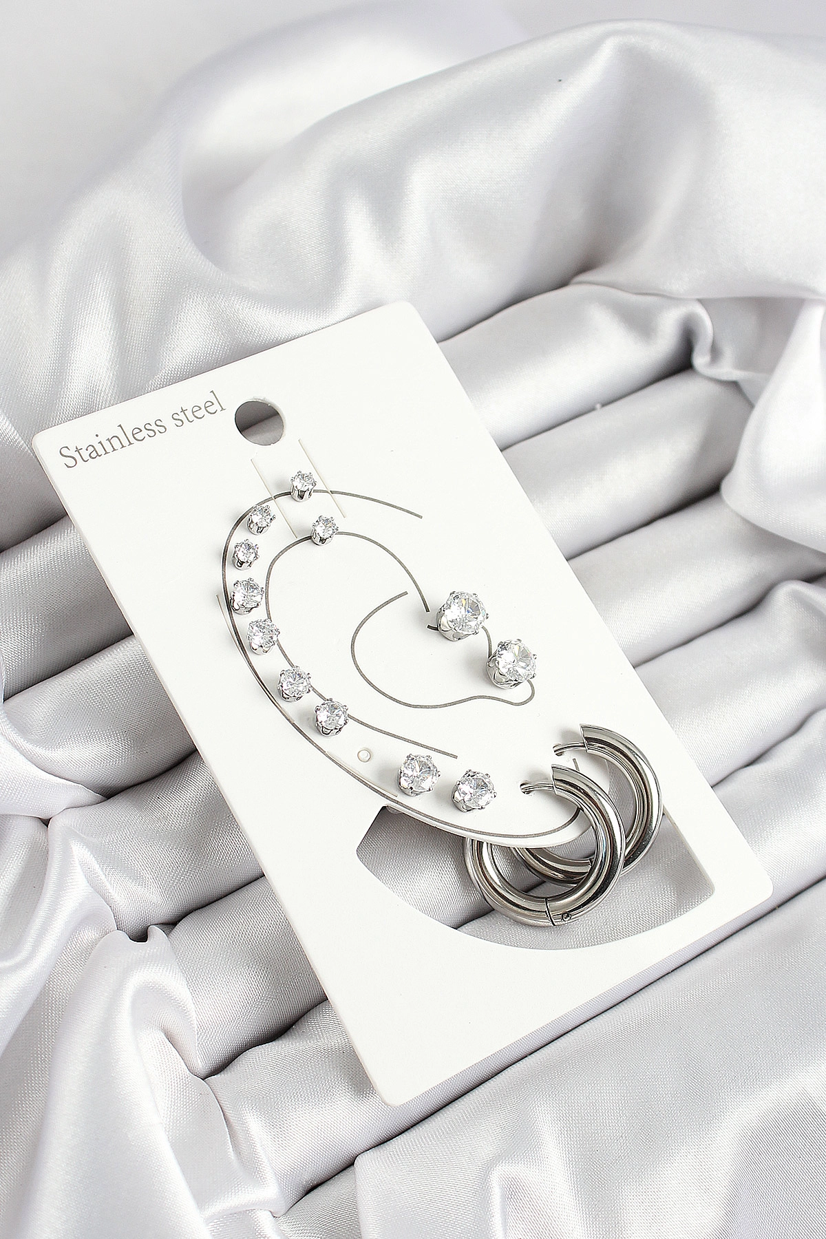 316L Çelik Halka Figürlü Ve Zirkon Taşlı Gümüş Renk 7'li Çift Kadın Küpe Set