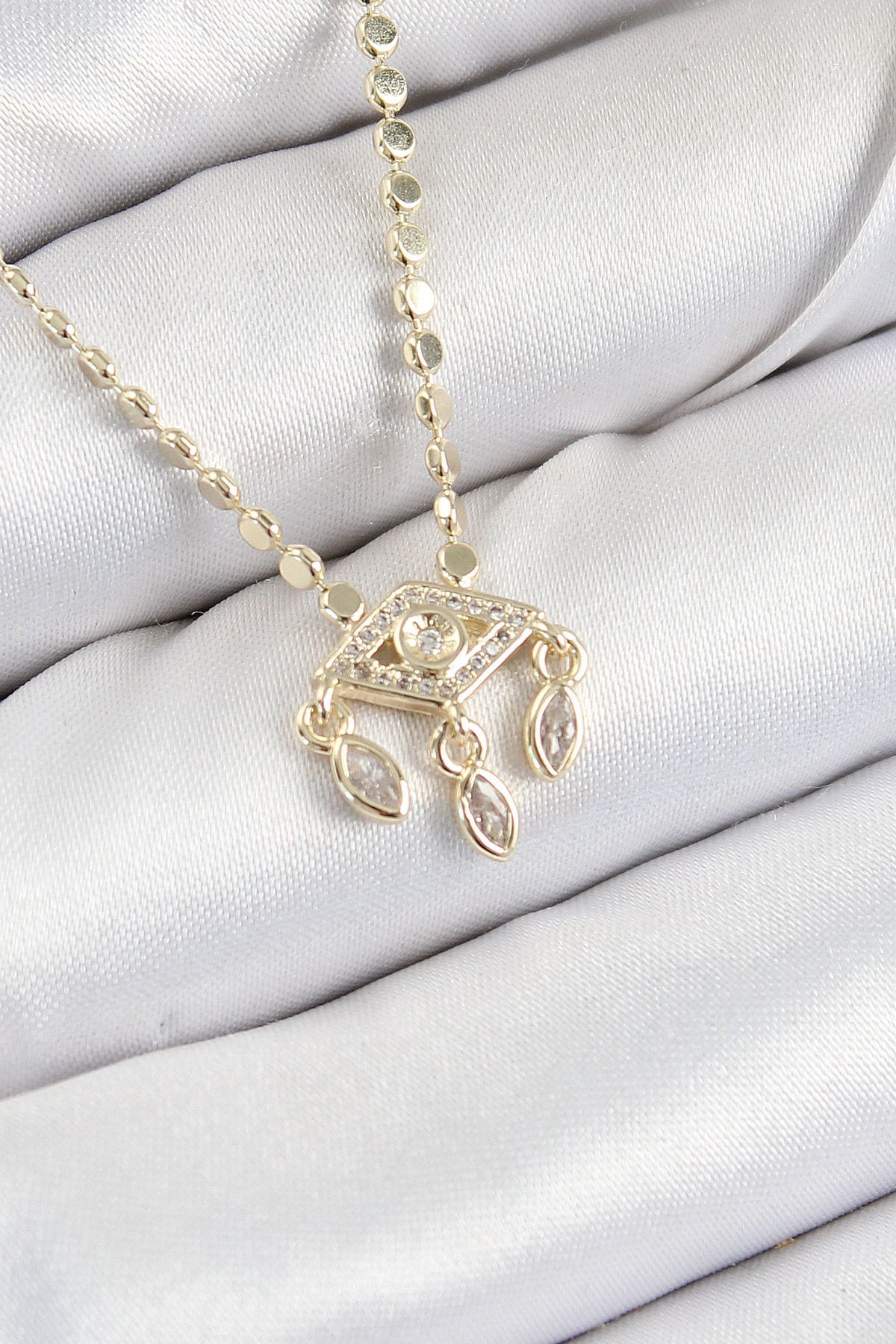 Pirinç Zirkon Taşlı Sallantılı Göz Model Ezme Zincir Gold Renk Kadın Kolye