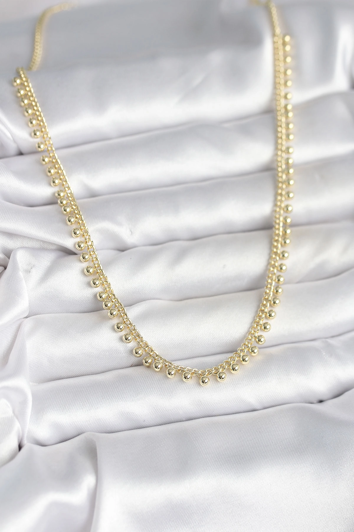 Pirinç Gold Renk Sıralı Topçuk Model Kadın Kolye