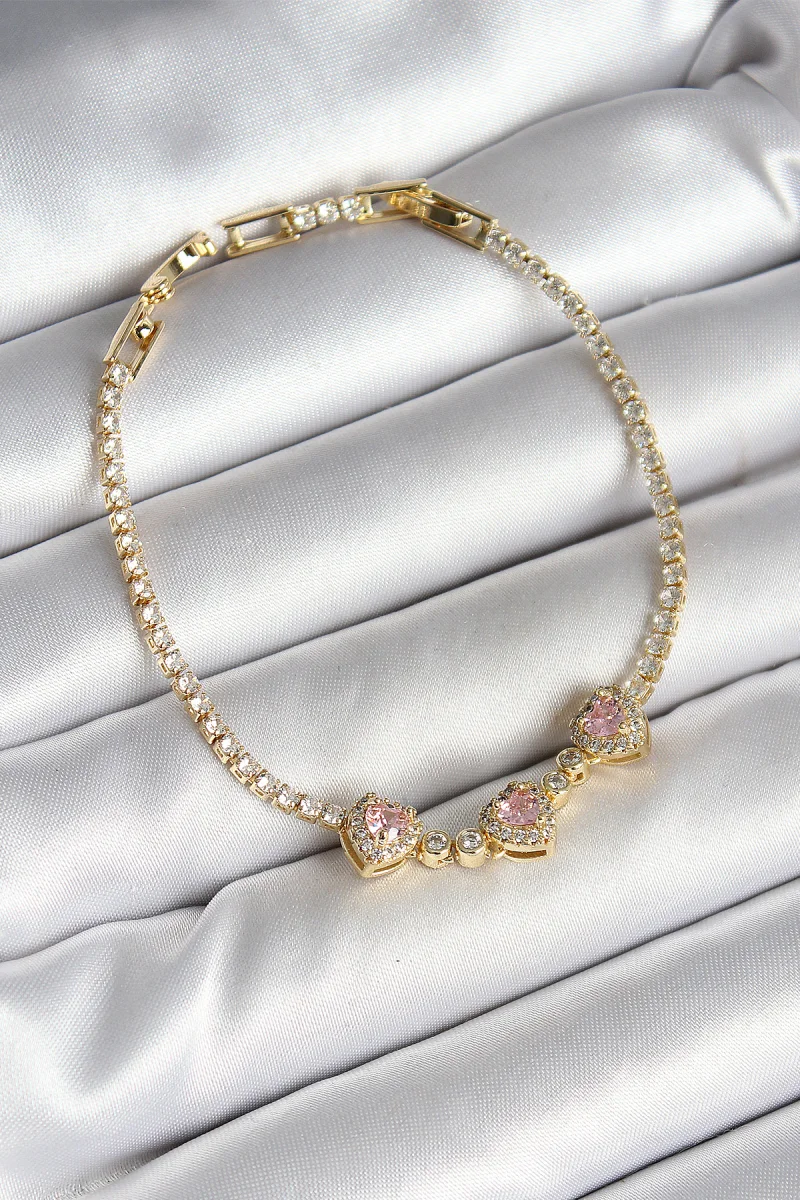 Pirinç Sıralı Pembe Kalp Figürlü Zirkon Taşlı Gold Renk Kadın Bileklik 5886