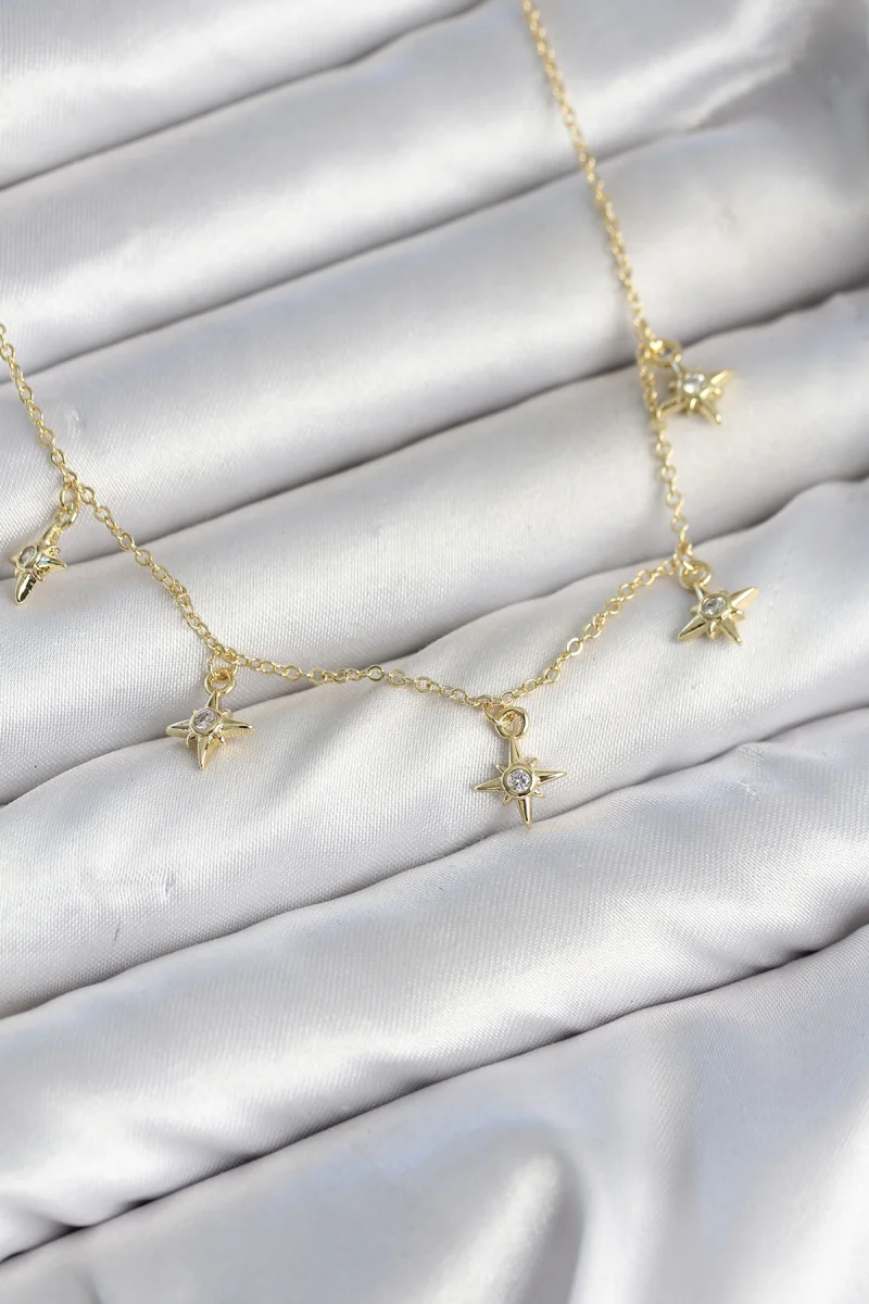 Pirinç Gold Renk Sıralı Minimal Kutup Yıldızı Model Kadın Kolye