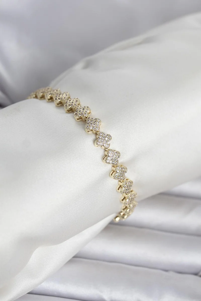 Pirinç Gold Renk Yonca Model Sıralı Zirkon Taşlı Kadın Bileklik